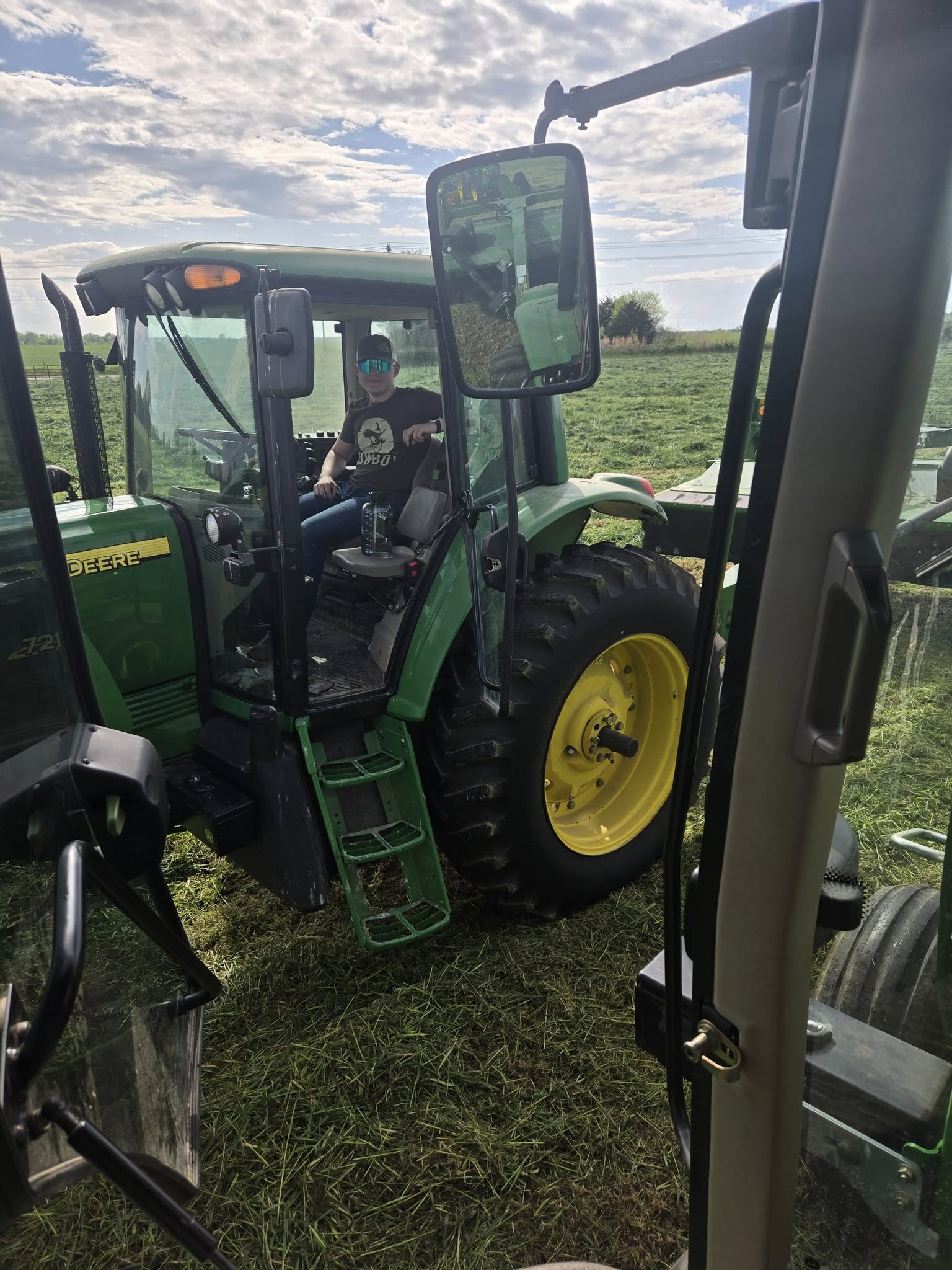Eli in his happy place-the tractor cab Eli in his happy place-the tractor cab