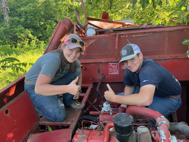 Marissa and Dylan doing on farm maintenance Marissa and Dylan doing on farm maintenance